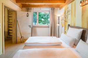 Schlafzimmer mit Doppelbett der Ferienhaus Ranch Little Joe